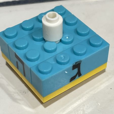 A dreidel made of building blocks